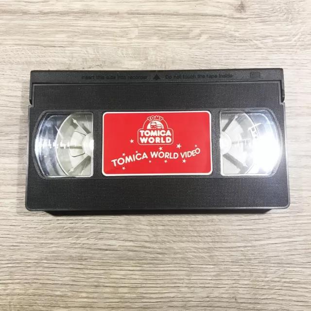 Cassette VHS TOMICA WORLD Catalogue Vidéo K7 Promo Pub Vintage Jouets TOMY Rare