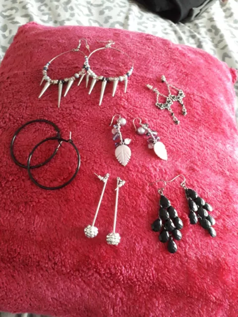 Six pairs of dangly earrings, costume jewellery