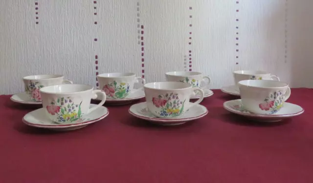 7 tasses a café en faïence de Lunéville KG réverbère