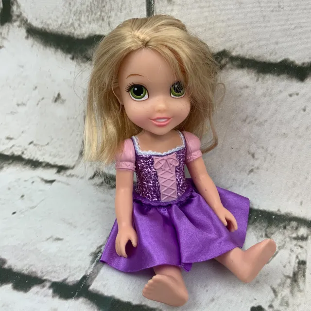 Disney Tangled Rapunzel Doll 6” Plastic Short Hair Green Eyes