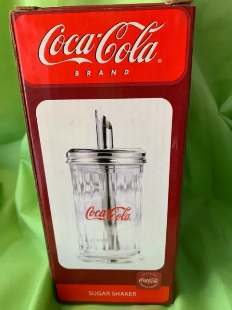 Vintage Coca Cola Sugar Shaker - Glass with silver coloured lid. Aprox 17cm High