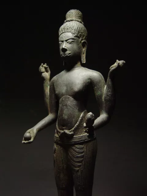 KHMER BRONZE STATUE OF A MULTI-ARM MALE DEITY, BAPHUON STYLE CAMBODIA. 16/17th C