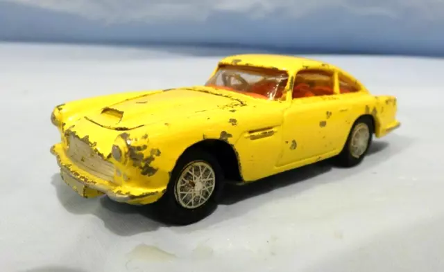 Corgi Toys Aston Martin DB4 218 Yellow Toy Car Red Interior Vintage 1960