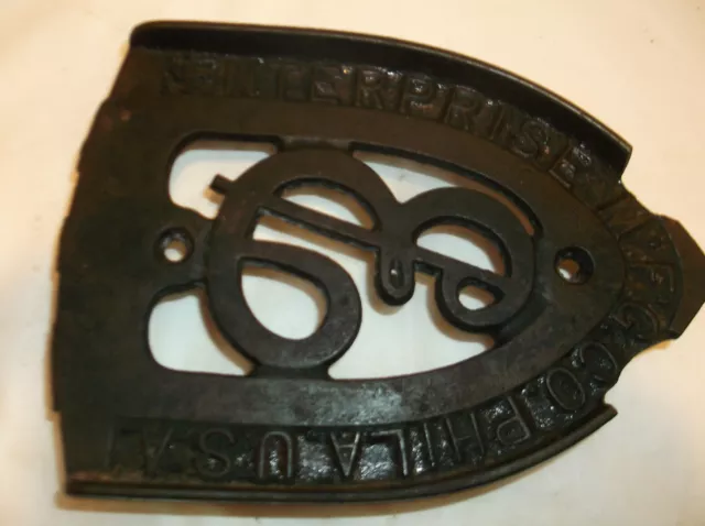 ANTIQUE CAST SAD IRON TRIVET Enterprize MFG CO. USA BLack