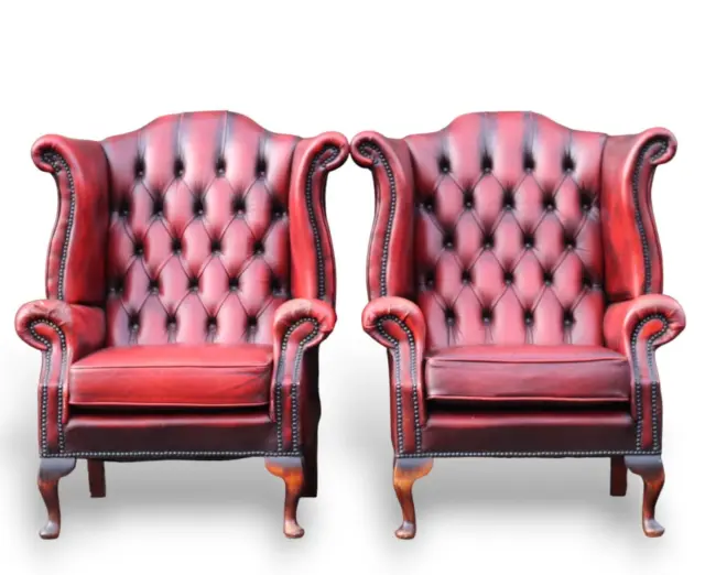 Pair of Vintage Chesterfield oxblood red leather chairs wing back armchairs