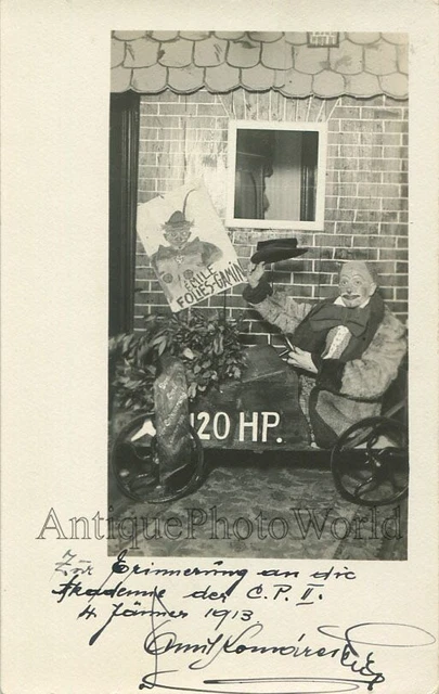Clown in toy race car strange antique signed private rppc circus photo