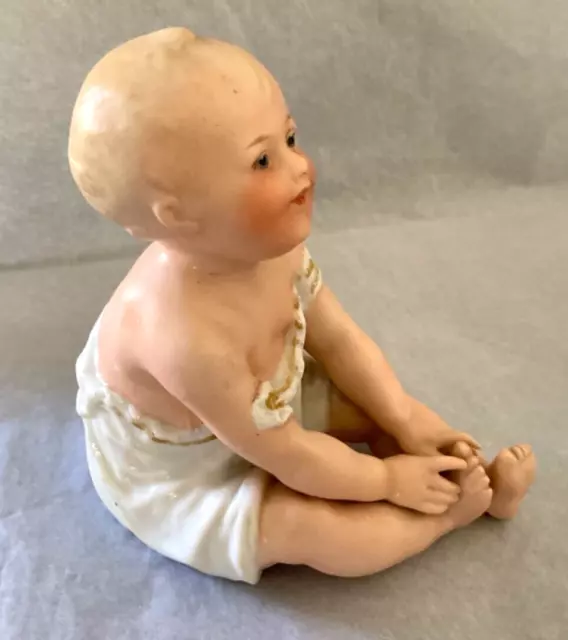 Antique Gebruder Heubach Seated Piano Baby No 23, 10.8 Cm Tall