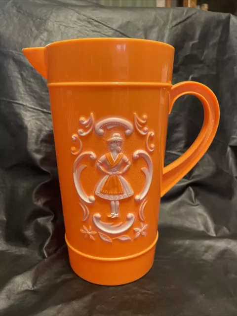 Vintage Regaline Beer Pitcher Plastic Orange German Couple Embossed 2 Qt. USA