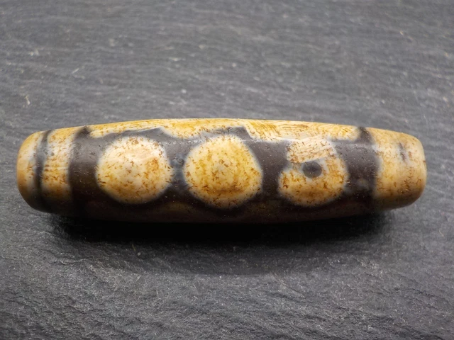 An Agate Dzi bead with a 5 Eye pattern from Tibet / Nepal.
