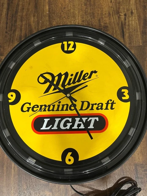 Miller Genuine Draft Clock with red neon light