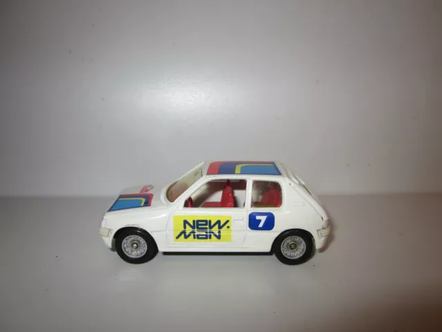 RARE PEUGEOT 205 GTI MONTE CARLO 1986 N° 7 NEW MAN SOLIDO au 1/43 TBE SANS BOITE