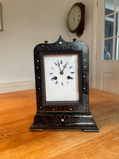 Antique french chiming ebonised and brass inlaid mantel clock