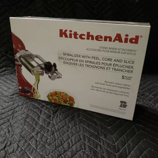 Espiralizador KitchenAid KSM1APC con cáscara, núcleo y rebanada. Accesorio mezclador de soporte