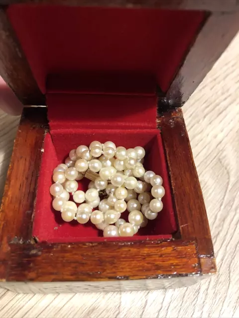 Collier ancien de perles de cultures blanches, fermoir diamants