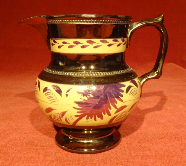 Ancien pot à lait  cruche  pichet en faîence de Jersey  or jaune violet