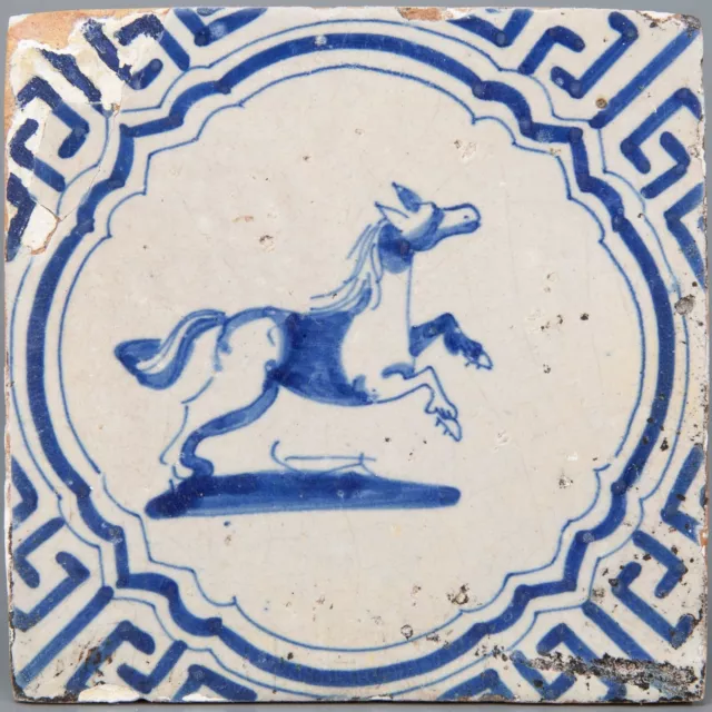 Nice Dutch Delft Blue animal tile, jumping horse, first half 17th. century.
