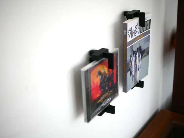Wall mount Comic or Pocket Book. CD DVD BD 4K UHD Display and Holder in one