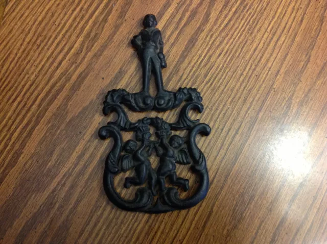 Vintage Black Cast Iron Cupid Cherub trivet JZH 1955