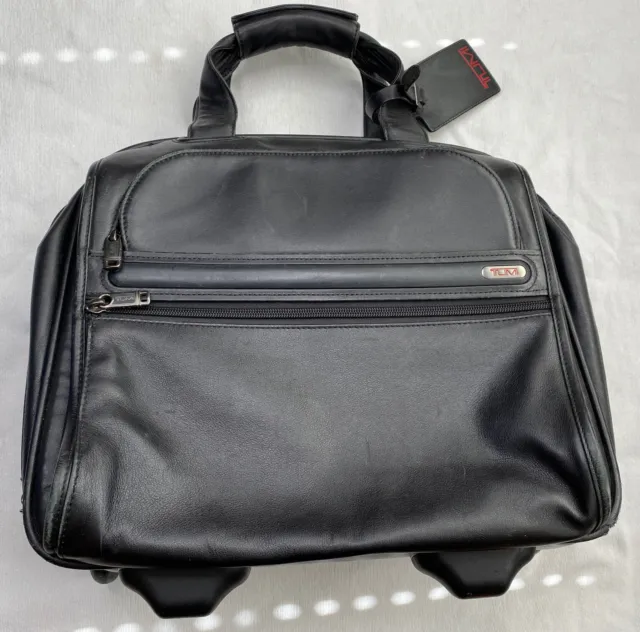 Tumi Black leather Carry On Bag Rolling Briefcase Bag Wheeled Handle -READ