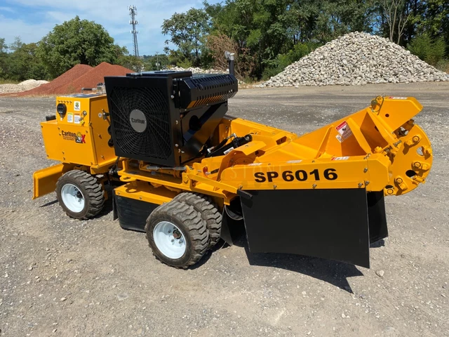 New Carlton Sp6016 Self Propelled Stump Grinder, Remote, 54Hp Gas, Scraper Blade