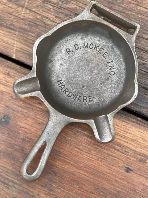 https://www.picclickimg.com/1tYAAOSwRqdld7aH/Griswold-Cast-Iron-HTF-00-Advertising-Ashtray-Skillet.webp