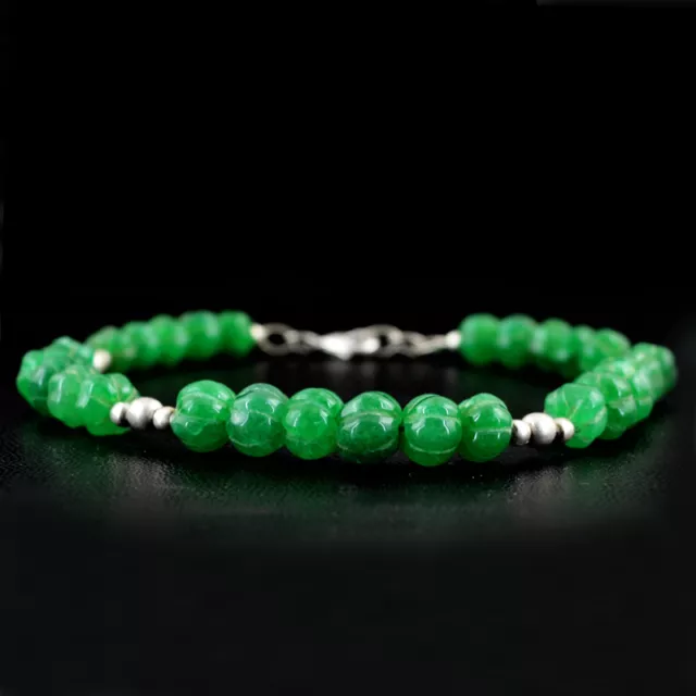 Genuine 106.60 Cts Earth Mined Green Emerald Round Carved Beads Bracelet (Rs)