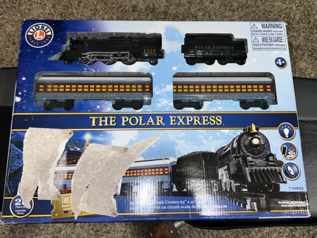 The Polar Express Train Set Battery Operated 28 Piece Read SLIGHTLY DAMAGED BOX