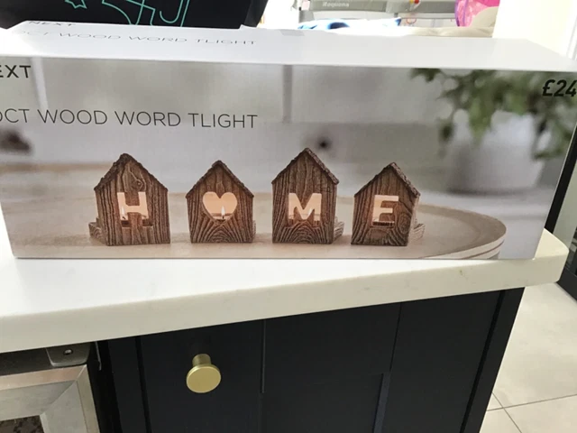 Accesorio de luces en T para decoración del hogar efecto madera Next totalmente nuevo en caja.