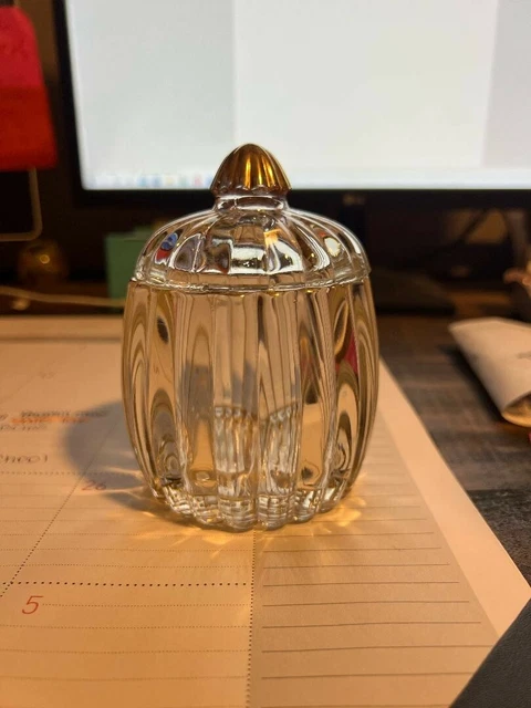 Vintage lidded jar with gold accents