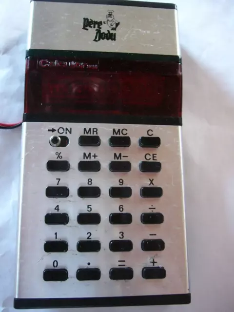 Petite calculatrice des années 80 Publicité "Père Dodu"