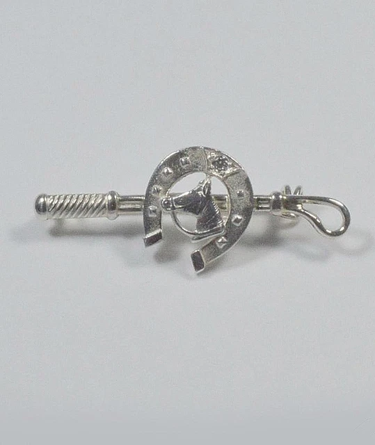 Silberne Brosche Thema Peitscheneisen und Pferdekopf Luce