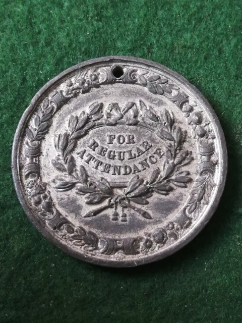 Victorian Regular Attendance School Medal.