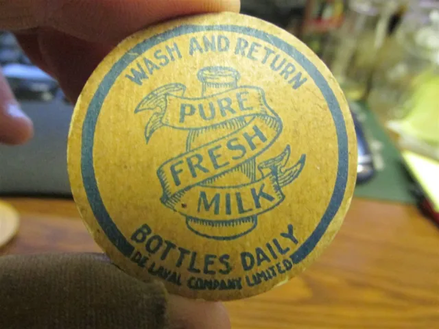 DELAVAL COMPANY LIMITED (CANADA) 2 different milk bottle caps CANADIAN ...