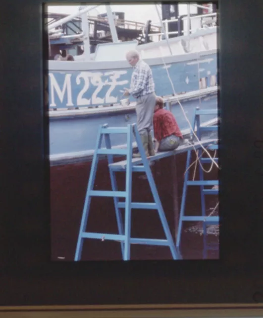 35mm Slide Amateur Photograph Men Painting Repairing Boat