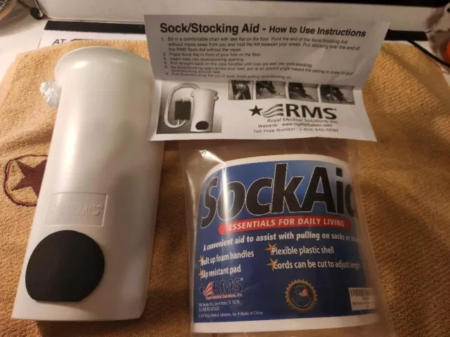 Brand New ~ Never Used = In The Factory Package = Deluxe = Sock Aid