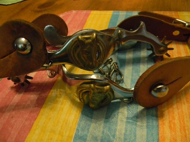 Horse head antique cowboy spurs