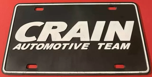 Crain Automotive Team Booster License Plate Arkansas Dealer PLASTIC