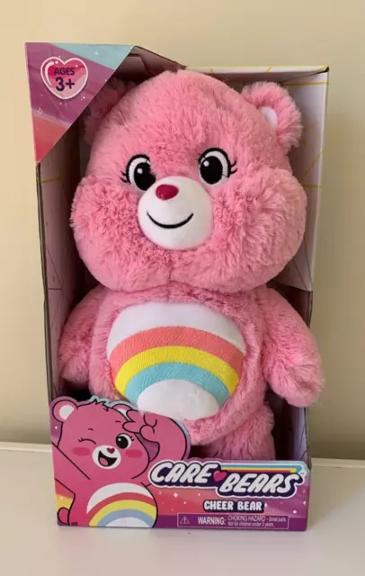Pink care bear deals with rainbow