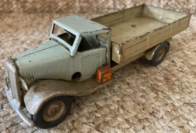 A fair used tinplate Triang Minic working clockwork delivery truck – Read text