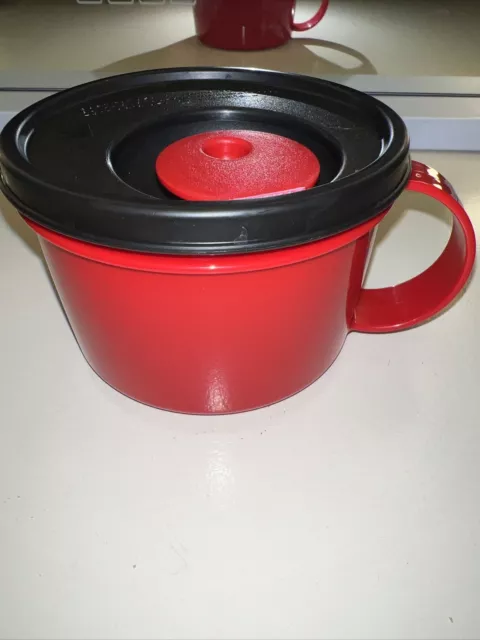 https://www.picclickimg.com/22YAAOSw6O1lTZtv/Tupperware-Crystalwave-Microwave-Safe-Hot-Soup-Mug-or.webp
