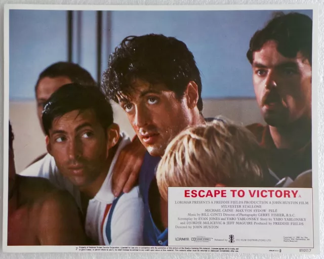 ORIGINAL 1981 LOBBY CARD 14 x 11 - 'ESCAPE TO VICTORY' - SLY STALLONE, JOHN WARK