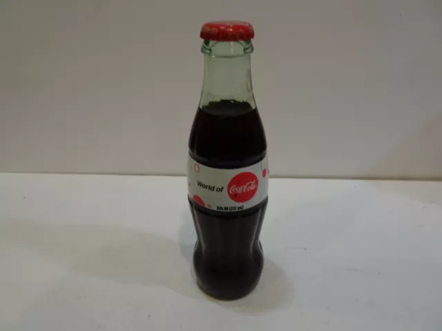 2009  World of  Glass Coca Cola  bottle   Very  Good Condition & Full