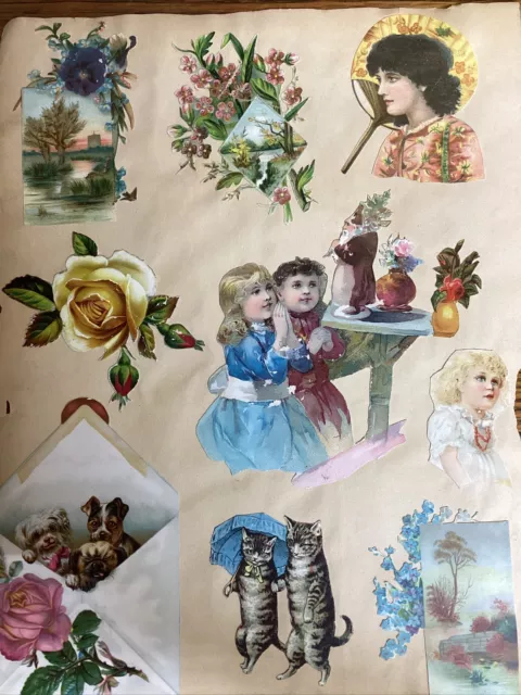 Página de libro de recortes troquelada de colección del siglo XIX con tarjetas victorianas y troquelados en ambos lados