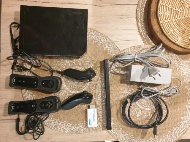 Console Nintendo Wii  + 2 Manette Wiimote + 2 Nunchuck + Cables + 9 Jeu