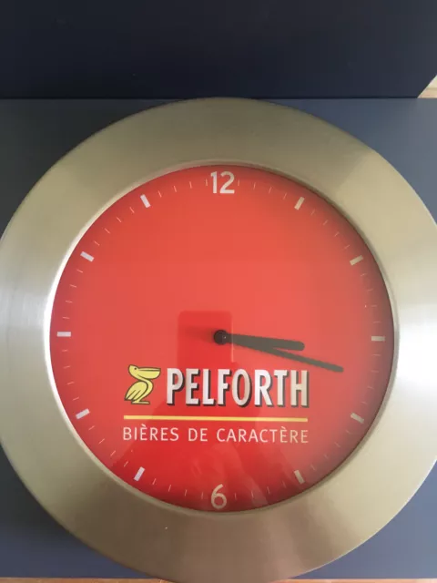 Pelforth horloge pendule publicitaire bière