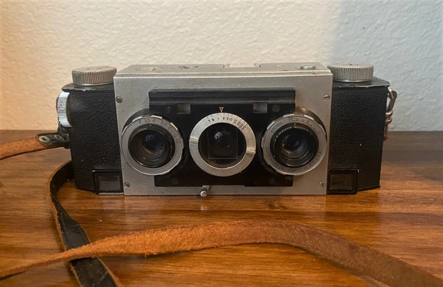 Cámara fotográfica vintage DAVID WHITE Company estéreo realista 35 mm con correa de cuero