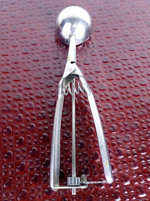 A very old stainless steel ice cream spoon, a gift for amateurs of old things an