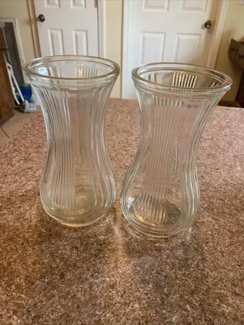 two vtg ribbed clear glass vases