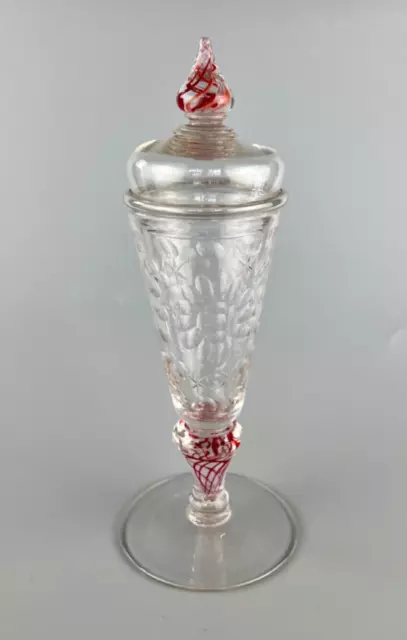 A rare early 18thc. colour twist glass goblet and cover c.1730