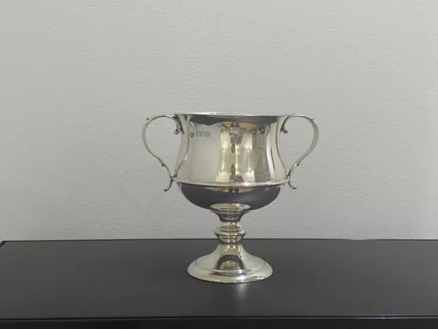 An excellent antique silver trophy cup hallmarked for London 1910 4 1/2inch,194g